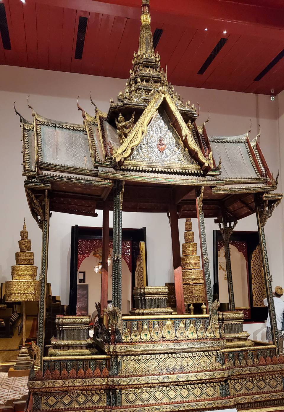 Intricate royal pavilion with gold detailing.
